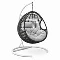 Sedia sospesa in rattan nero con cuscino grigio e struttura in acciaio